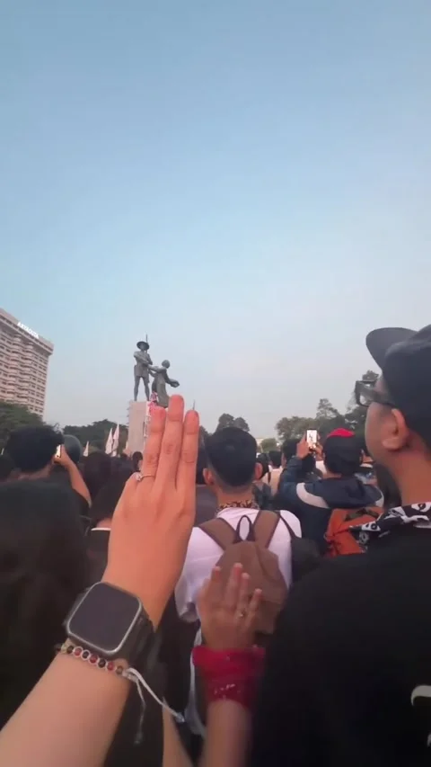 Protesters Raise Three Finger Salute at Tugu Tani Monument Rally Stock Footage 348288724