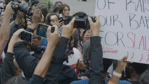 Protesters taking photos outside, BLM, Hollywood, LA, June 3, 2020 Stock Footage 136230501