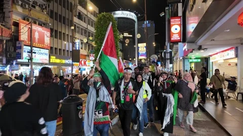 Protesters walk and chanting in support solidarity Palestine Stock Footage 318088897