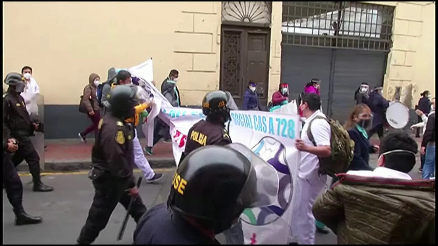 Protesting Health Workers In Peru Met With Police Scuffles, Water Cannon Stock Footage