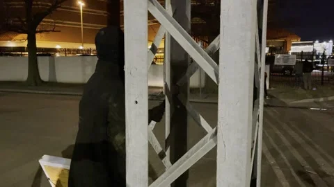 Protestor Banging on High Voltage Sign in Oklahoma March 28th 2021 Video stock 264182538