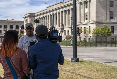Protestor being interviewed Foto stock