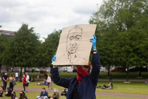 Protestor during the BLM Movement with illustration of George Floyd Stock Photos