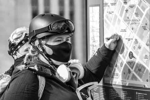 Protestor near map Stock Photos