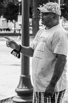 Protestor on sidewalk Stock Photos