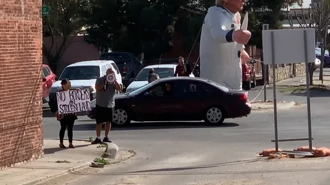 Protestor speaks on a megaphone Stock Footage 109171591