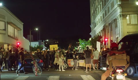 Protestors block intersections Hollywood Blvd Stock Footage 142390219