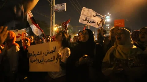 Protestors chant in Tahrir Square in Cairo, Egypt. Video stock 25461635