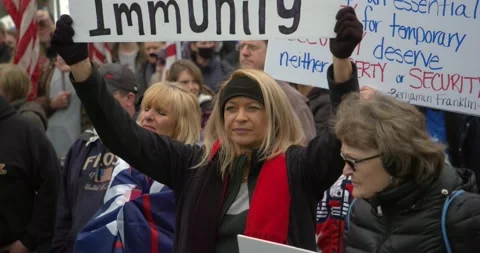 Protestors gather to demand the re-opening of the state during COVID-19 動画素材 131287879