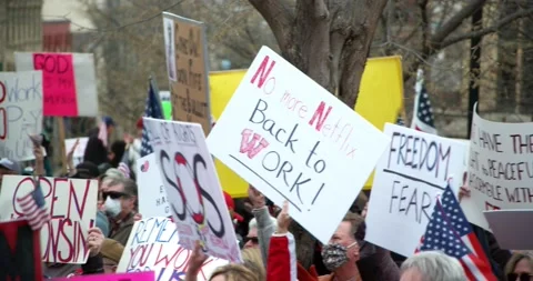 Protestors gather to demand the re-opening of the state during COVID-19 動画素材 131290632