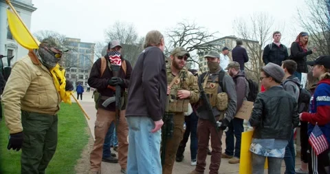 Protestors gather to demand the re-opening of the state during COVID-19 動画素材 131296154