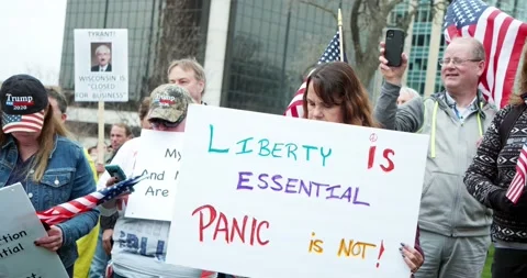 Protestors gather to demand the re-opening of the state during COVID-19 動画素材 131297262