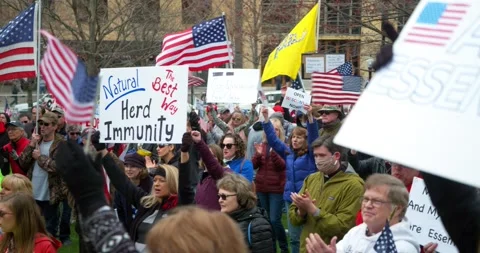 Protestors gather to demand the re-opening of the state during COVID-19 Видео 131308660