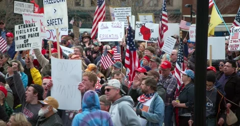 Protestors gather to demand the re-opening of the state during COVID-19 Видео 131309830