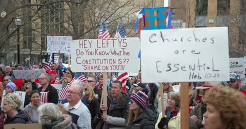 Protestors gather to demand the re-opening of the state during COVID-19 Stock-Footage 131314532