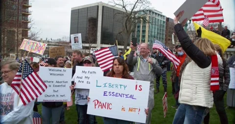 Protestors gather to demand the re-opening of the state during COVID-19 Stock-Footage 131314613