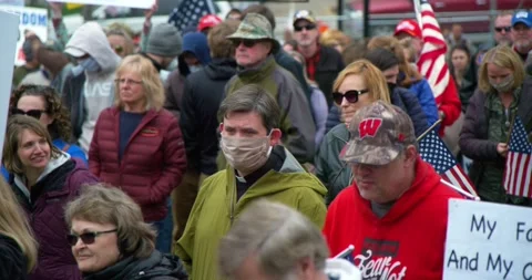 Protestors gather to demand the re-opening of the state during COVID-19 Stock-Footage 131317096