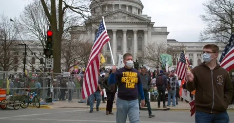 Protestors gather to demand the re-opening of the state during COVID-19 Stock-Footage 131318620