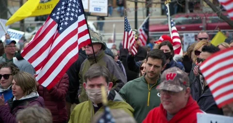 Protestors gather to demand the re-opening of the state during COVID-19 Stock-Footage 131318721