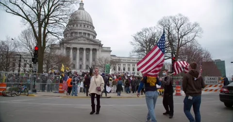 Protestors gather to demand the re-opening of the state during COVID-19 Stock-Footage 131318928