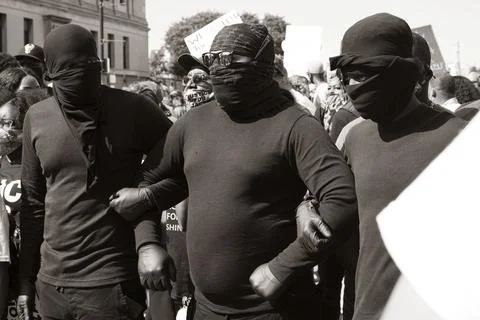 Protestors linking arms Stock Photos