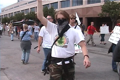 Protestors March in Anti-Globalization Protest in Austin, Texas Video stock 35001359