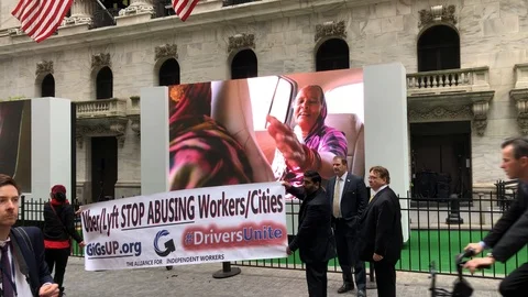 Protestors protest against Uber Technologies Inc. (NYSE: UBER) becomes public Stock Footage 121824908