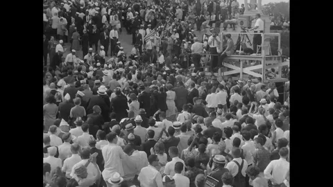Protestors sing as the March on Washington ends in 1963. Stock Footage 123367219