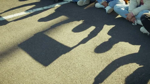 Protestors sitting on highway for rights Stock Footage 328798391