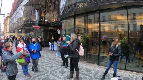 Protests and rap against the wearing of masks on the streets of Prague Stock Footage 170344692