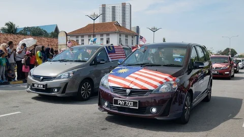 Proton car join the Merdeka Parade at Bagan. Stock Footage 119343355