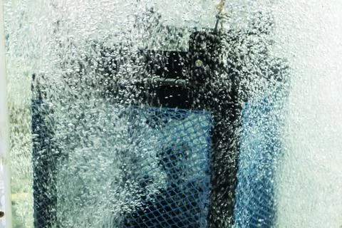 Prototype Underwater Device Testing with Air Bubbles in Water Tank Stock Photos