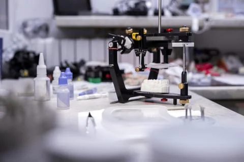 Prototypes of false teeth, creation of teeth, devices of prosthetics Stock Photos