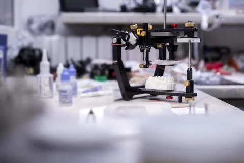 Prototypes of false teeth, creation of teeth, devices of prosthetics Stock Photos