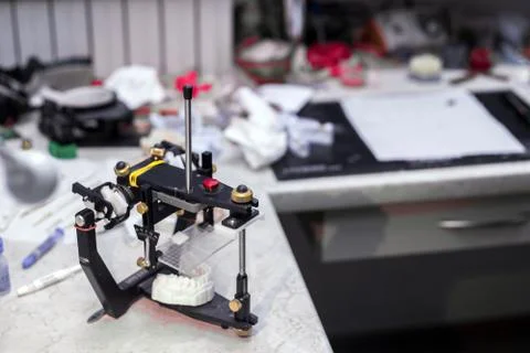 Prototypes of false teeth, creation of teeth, devices of prosthetics Stock Photos