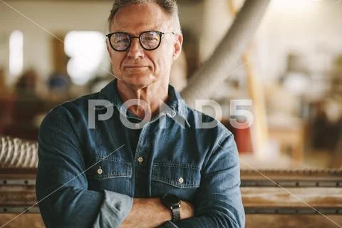 Proud carpentry workshop owner Stock Photos