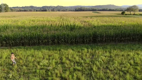 Proud Farmer Walking on His Fields at Sunset Stock Footage 138094875