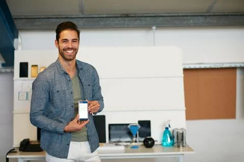 Proud to launch my new app for android phones. Portrait of a young man Stock Photos