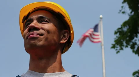 Proud worker in front of American flag Stock Footage 6112801