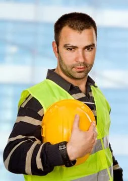 Proud worker standing looking at the camera Stock Photos