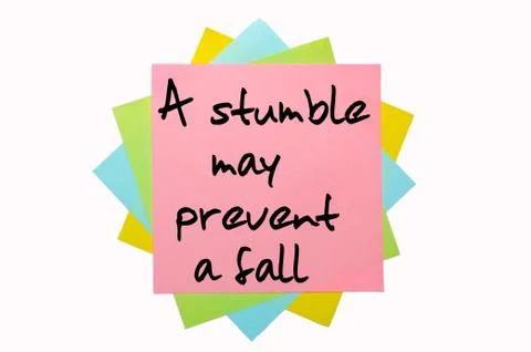 Proverb "a stumble may prevent a fall" written on bunch of sticky notes Stock Photos