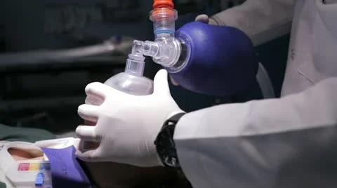 Providing artificial ventilation Stock Footage 12592658