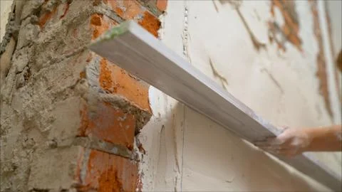 The Provila tool is applied to the wall. The solution is applied to the wall  Stock Photos