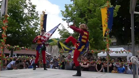 PROVINS, FRANCE - JUNE 16, 2019: Asti Flag  wavers show juggling art Stock Footage
