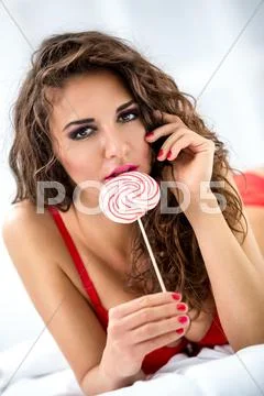 Provocative Woman With Lollipop