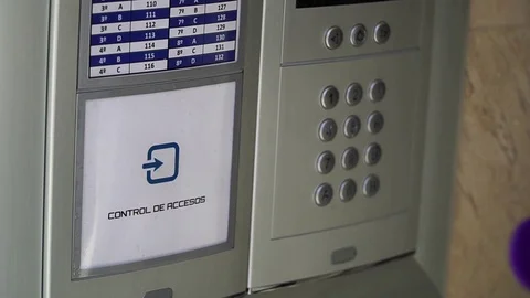 Proximity access control. Door access control with a hand inserting key card to Stock Footage 126665368