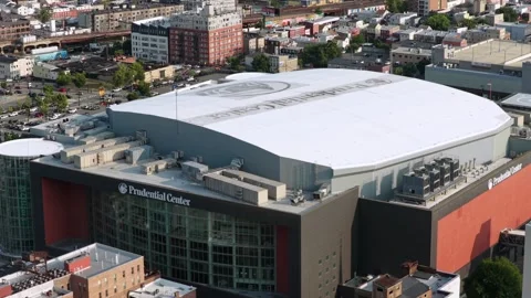 Prudential Center arena rooftop bears painted team logo above glass entrance Stock Footage 341690465