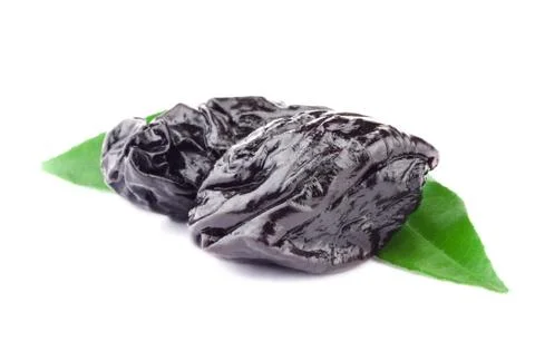 Prune with green leaf Stock Photos