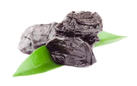 Prune with green leaf Stock Photos