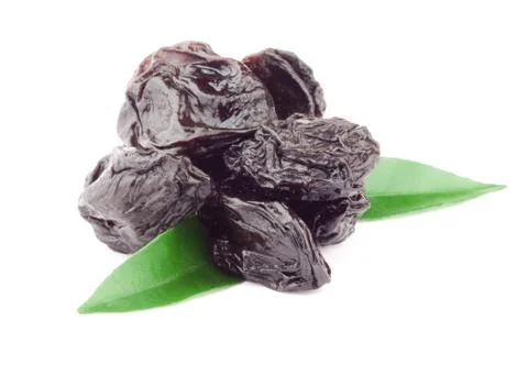 Prune with green leaf Stock Photos